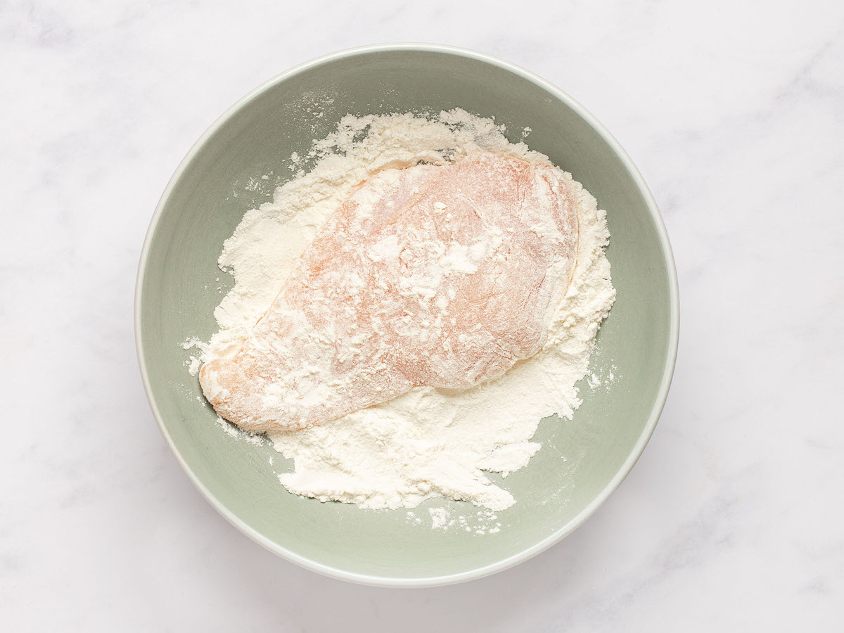 coating chicken in flour
