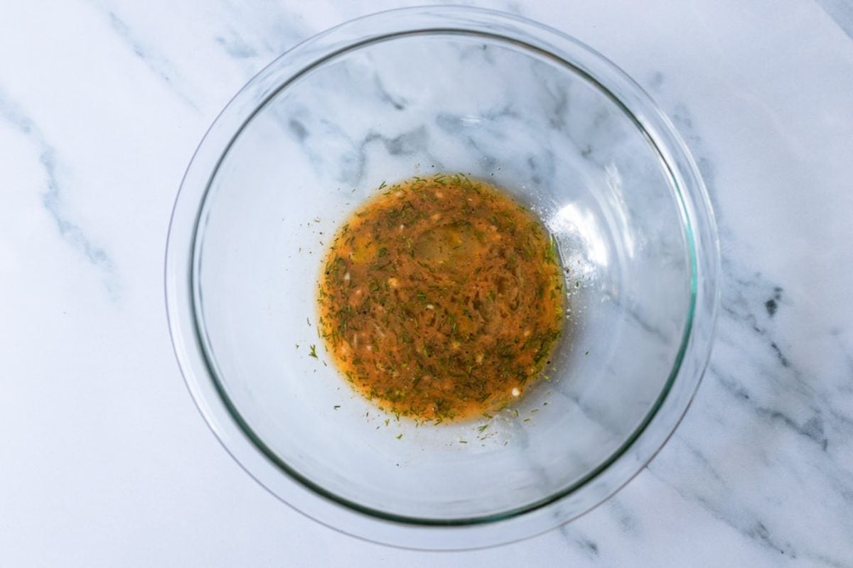 Wet meatball ingredients mixed in a bowl.