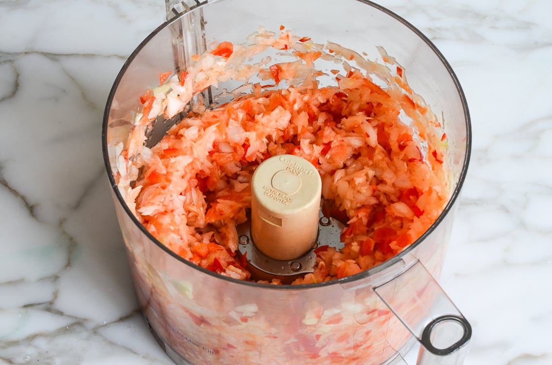 Minced vegetables for chili in food processor.