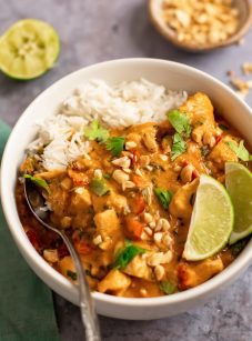 panang curry over rice in bowl