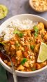 panang curry over rice in bowl