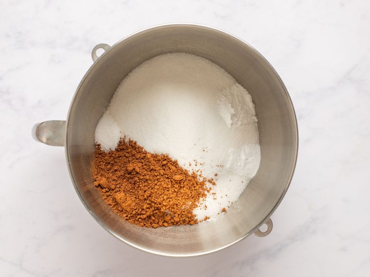flour, cocoa powder, sugar, salt, baking powder, and baking soda in mixing bowl