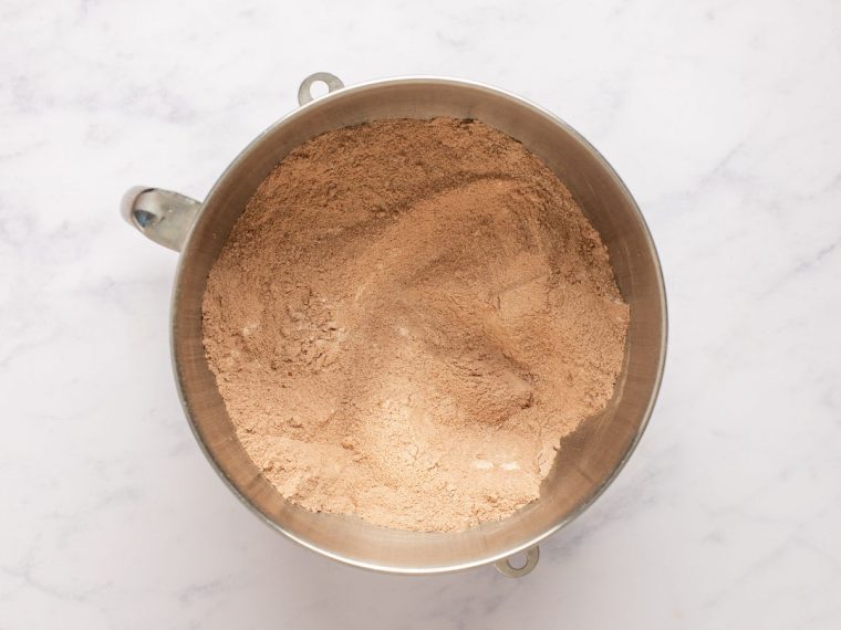 flour, cocoa powder, sugar, salt, baking powder, and baking soda combined in mixing bowl