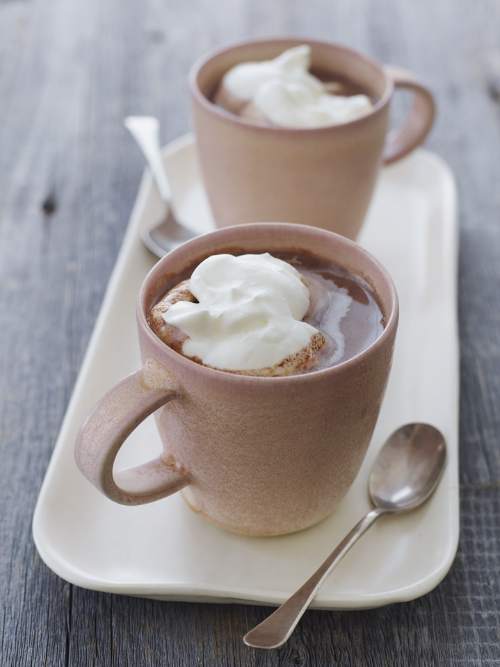 2 mugs of hot chocolate with whipped cream