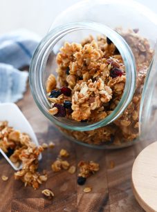 Granola in and around a jar.