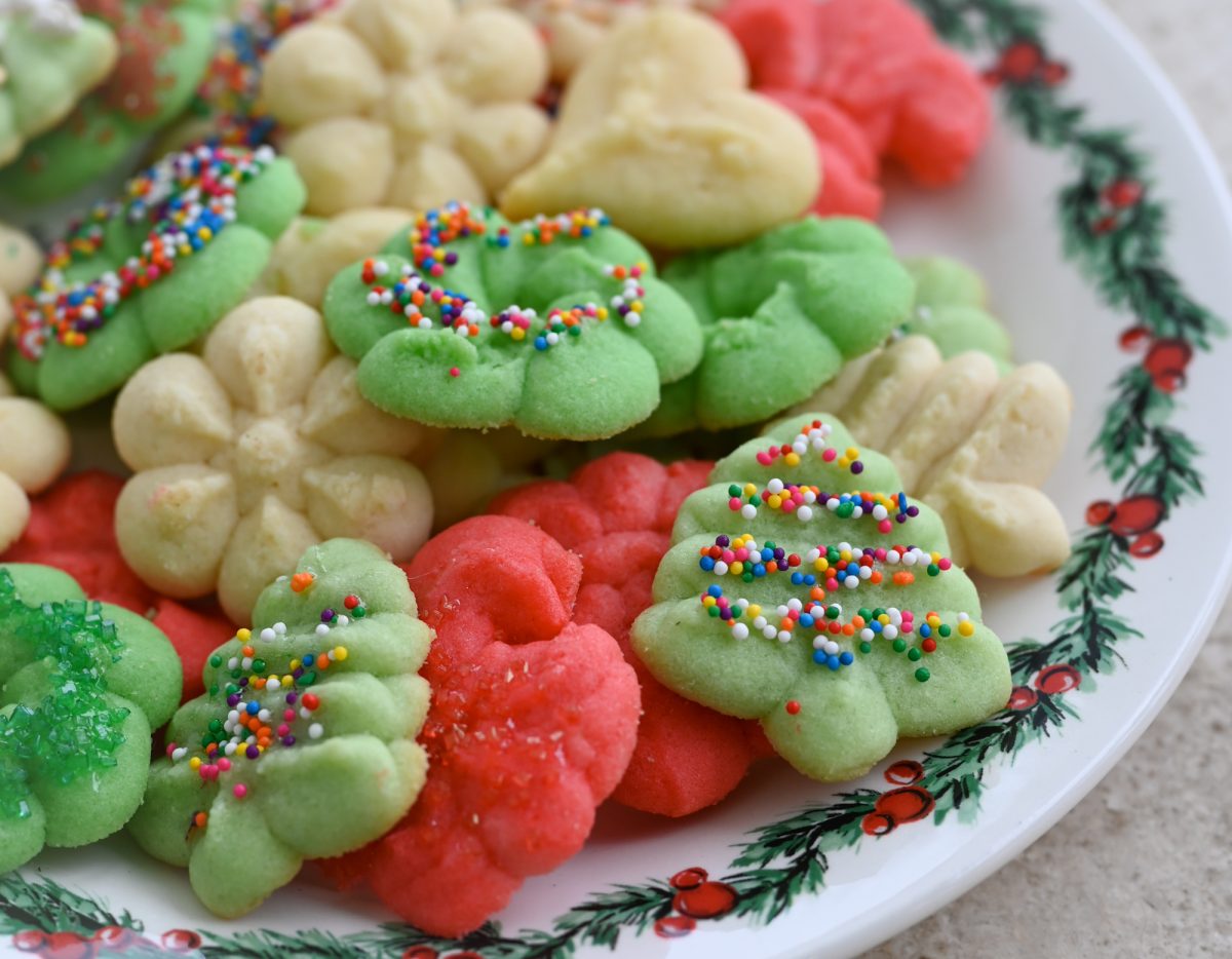 spritz cookies on Christmas plate.