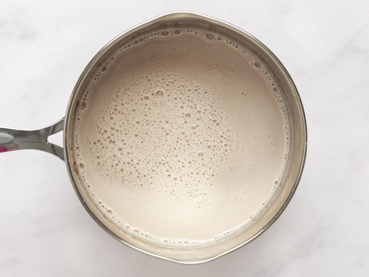 bring milk, cream, brown sugar, cocoa powder, and salt to a simmer