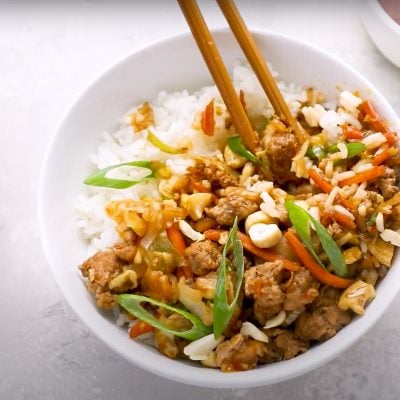egg roll in a bowl with chopsticks