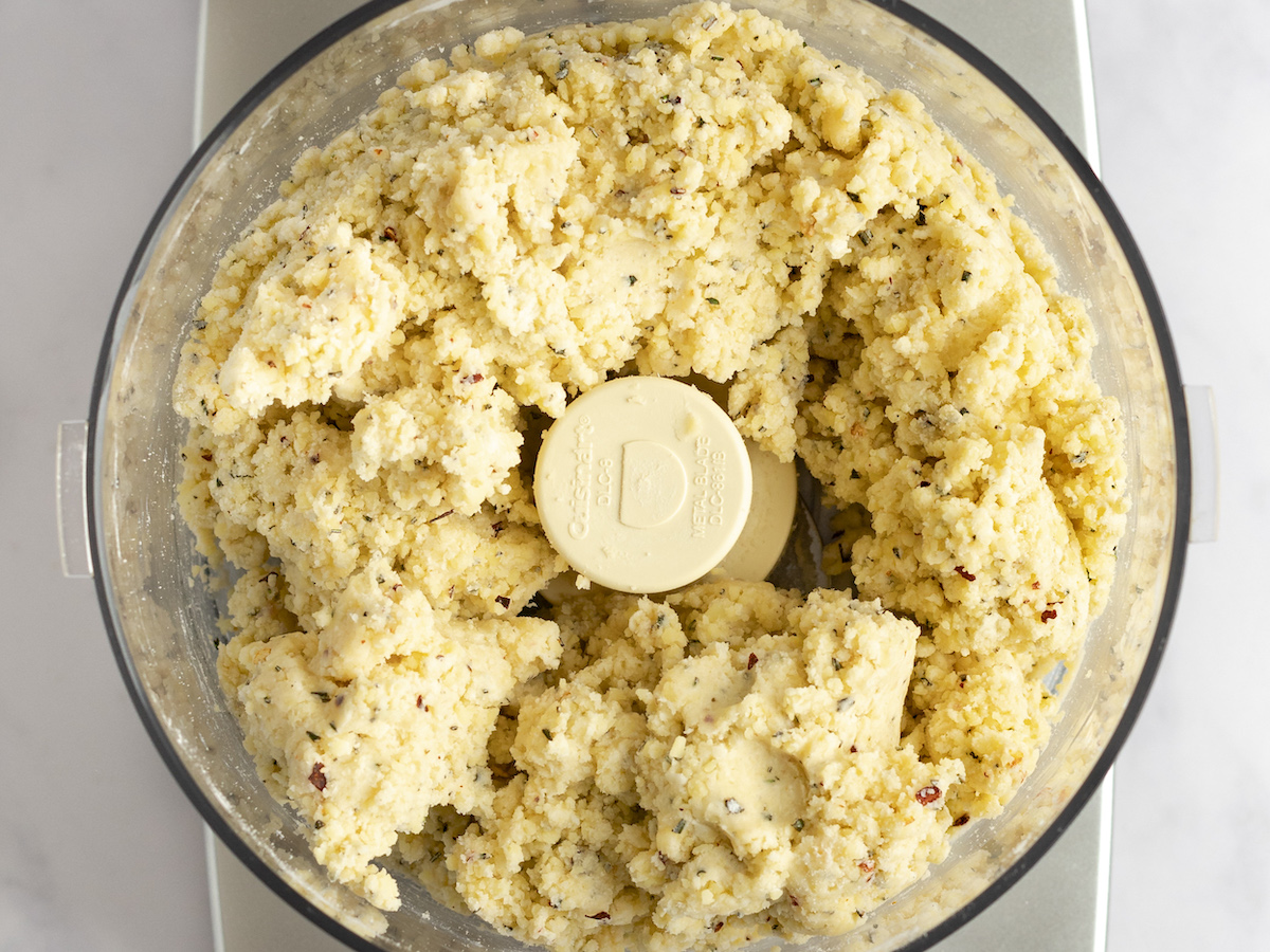 blended cheese straw dough in food processor.
