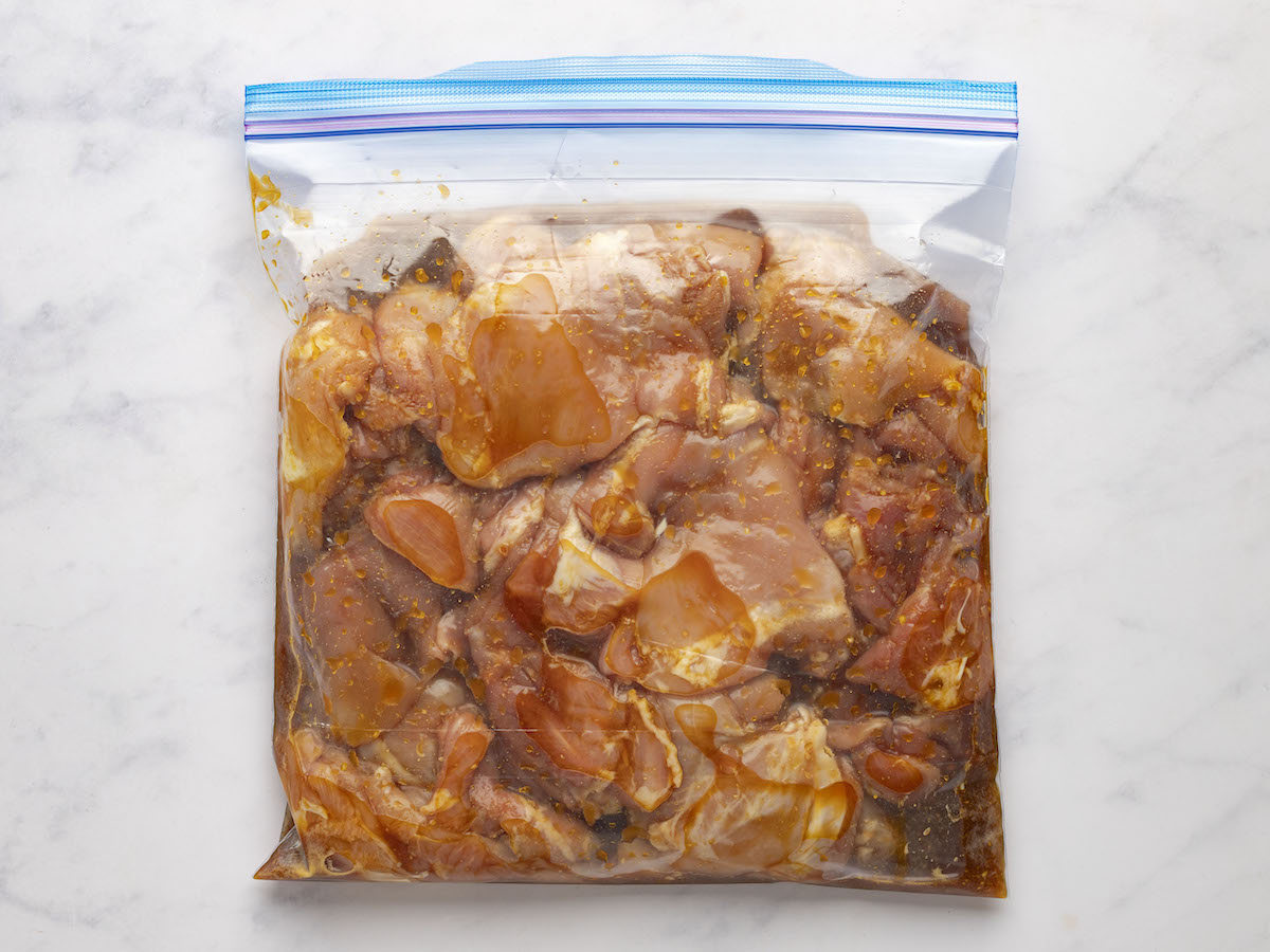 chicken marinating in bag.