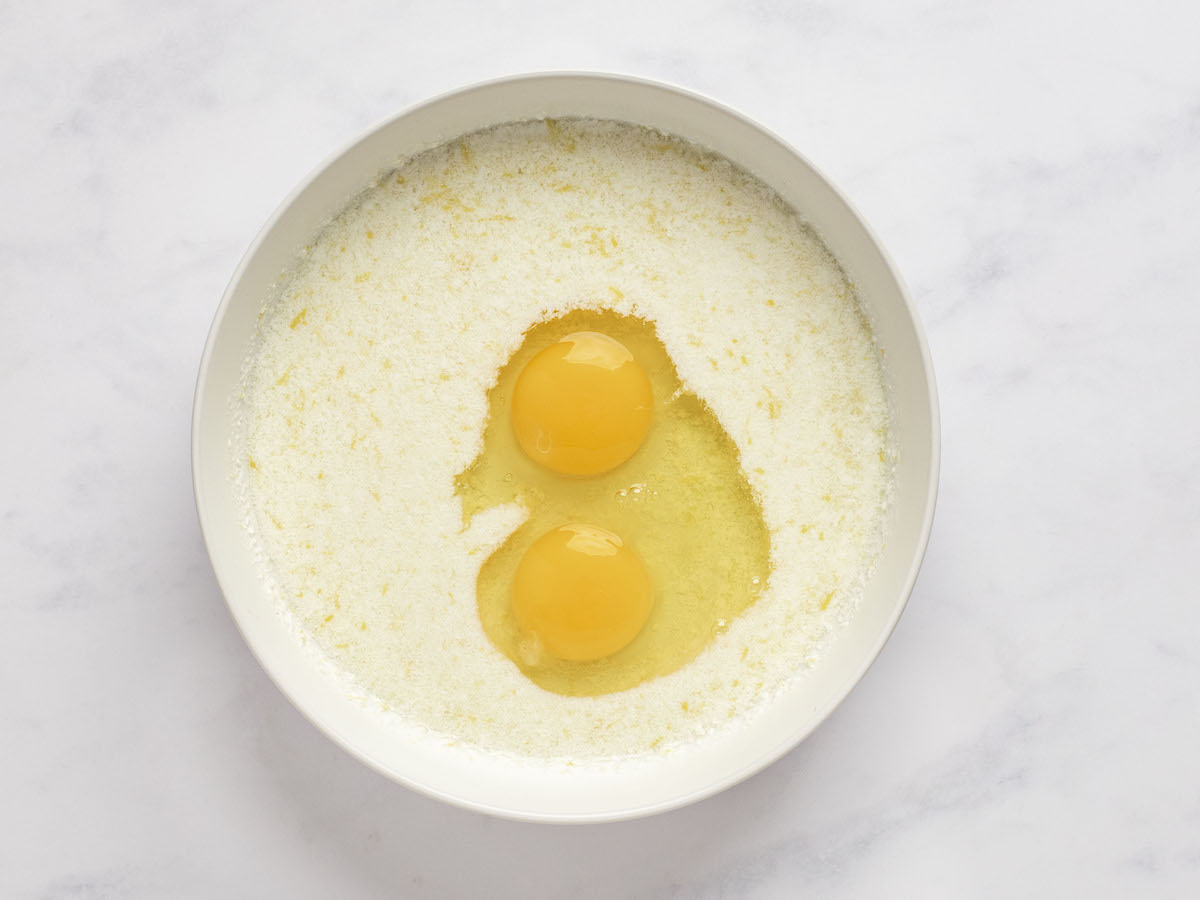 eggs added to the curdled lemon/milk mixture in small bowl