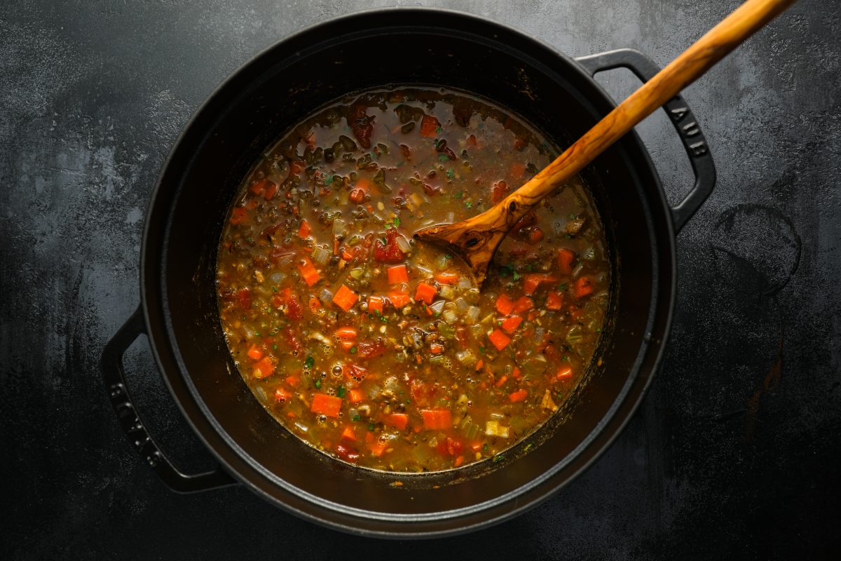 thickened lentil soup in pot.
