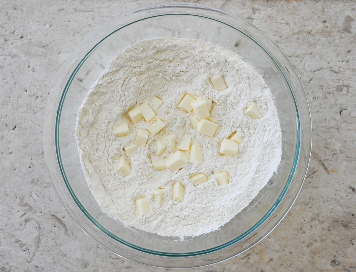 cubes of butter added to dry ingredients