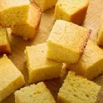 cornbread pieces on wooden board