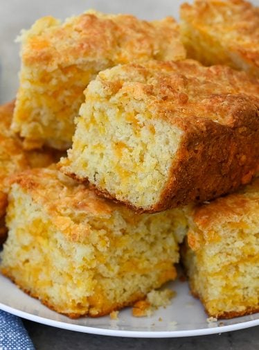 slices of irish cheddar soda bread on a plate.