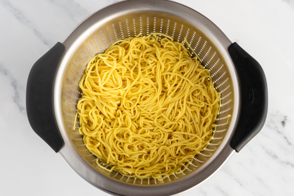 drained yakisonba noodles in strainer