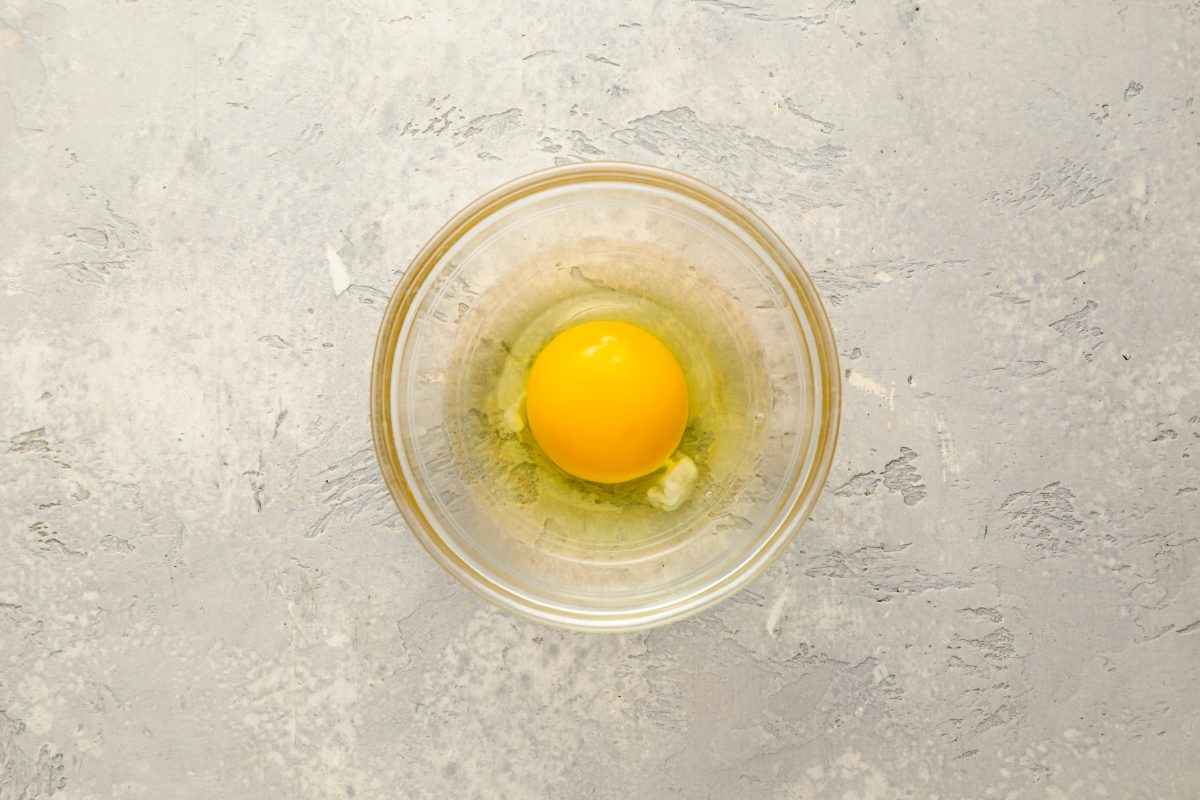 unbeaten egg in small bowl