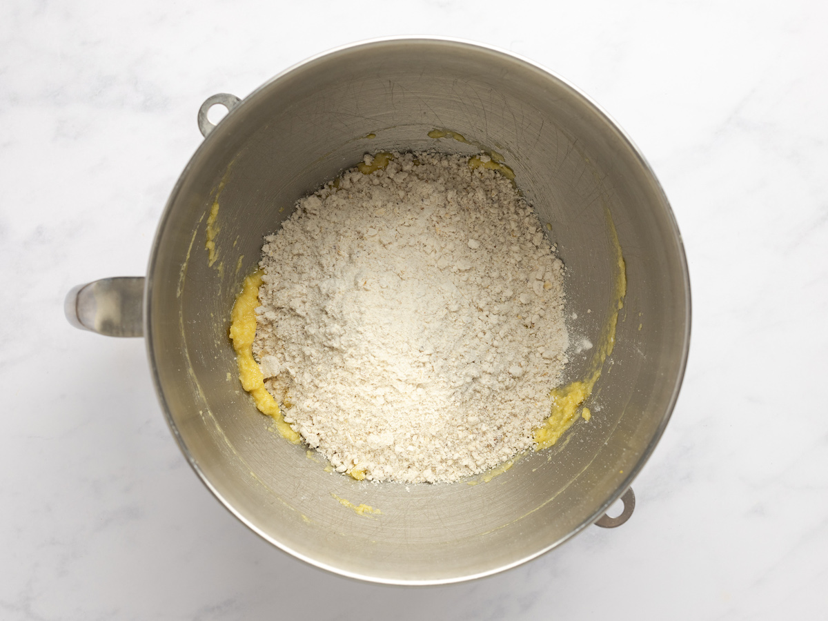 dry ingredients added to butter and egg mixture.