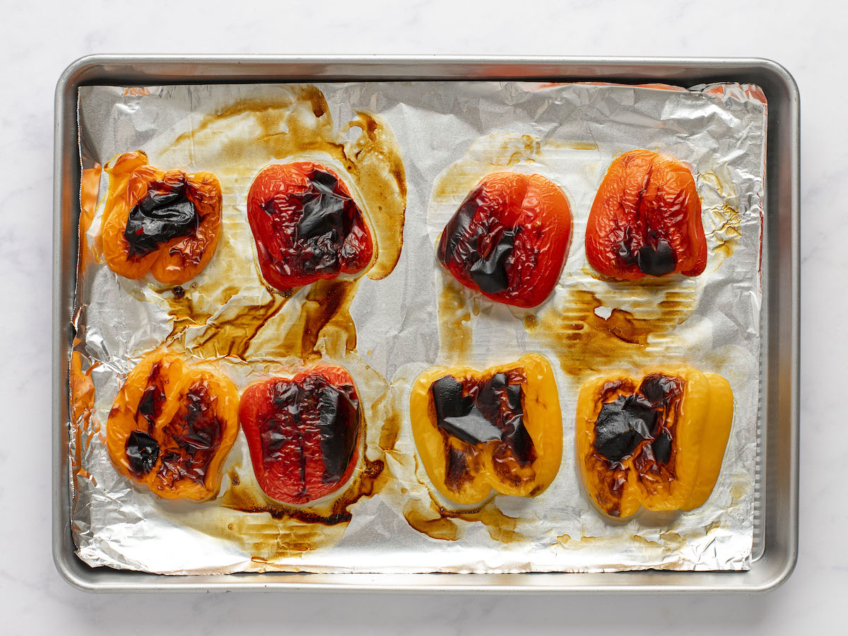 roasted peppers on foil-lined baking sheet.