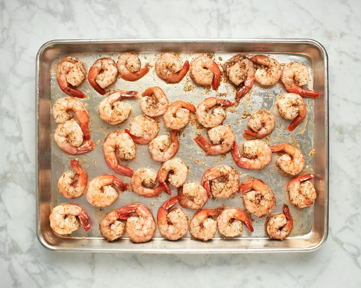 roasted shrimp on baking sheet.