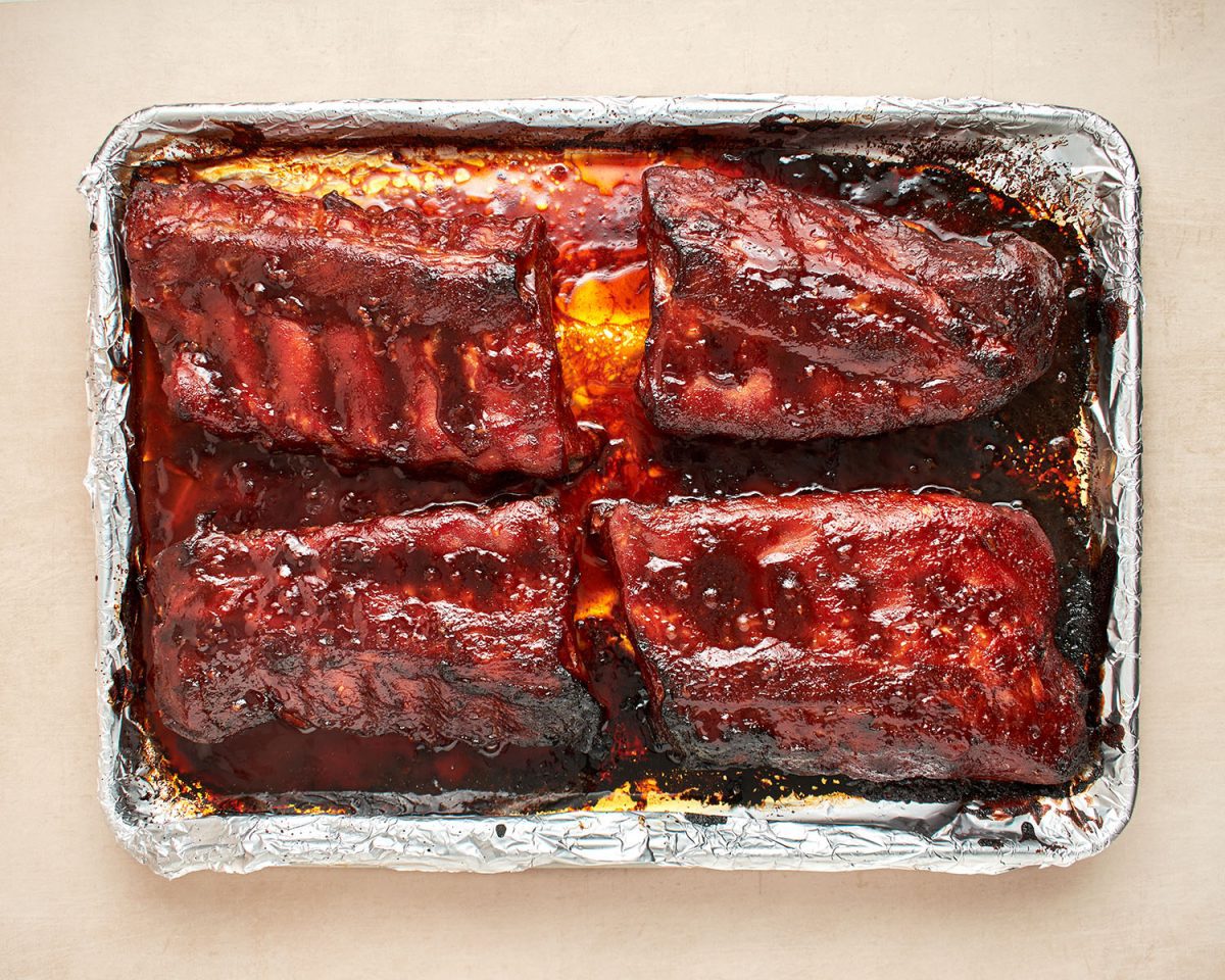 sauced ribs out of the oven.