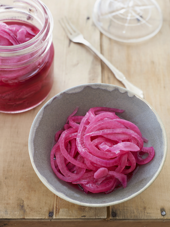 bowl and jar of pickled red onions