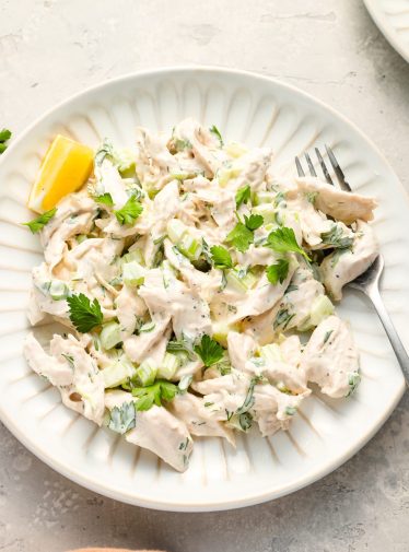 chicken salad on plate with fork.