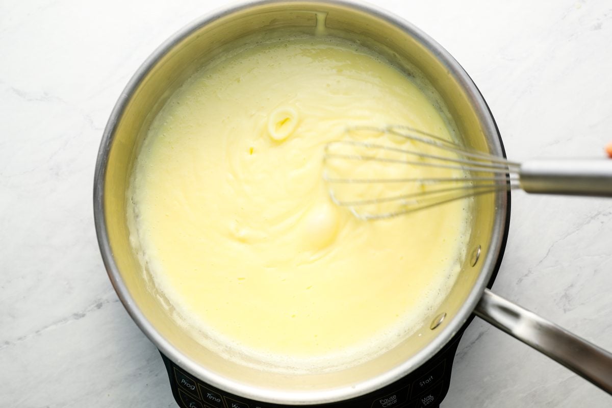 whisking bubbling mixture in medium sauce pan