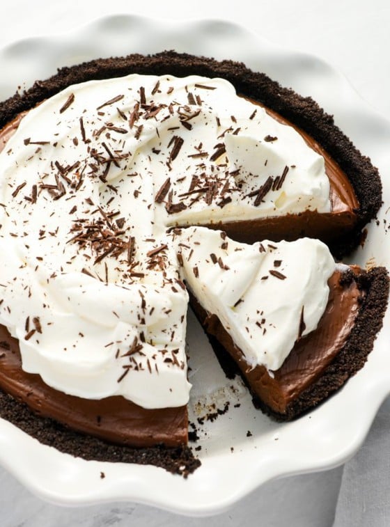 sliced chocolate cream pie with linen napkin