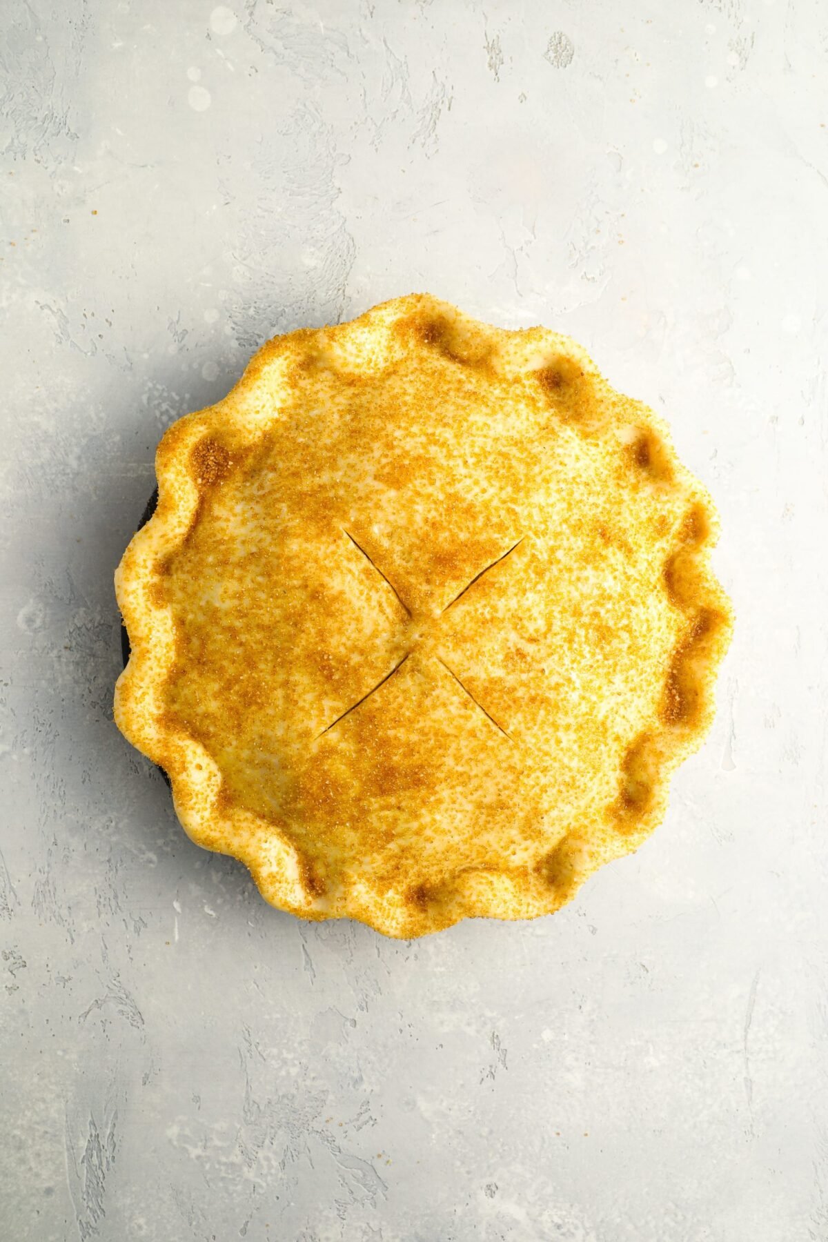 top crust with four 3-inch slits cut