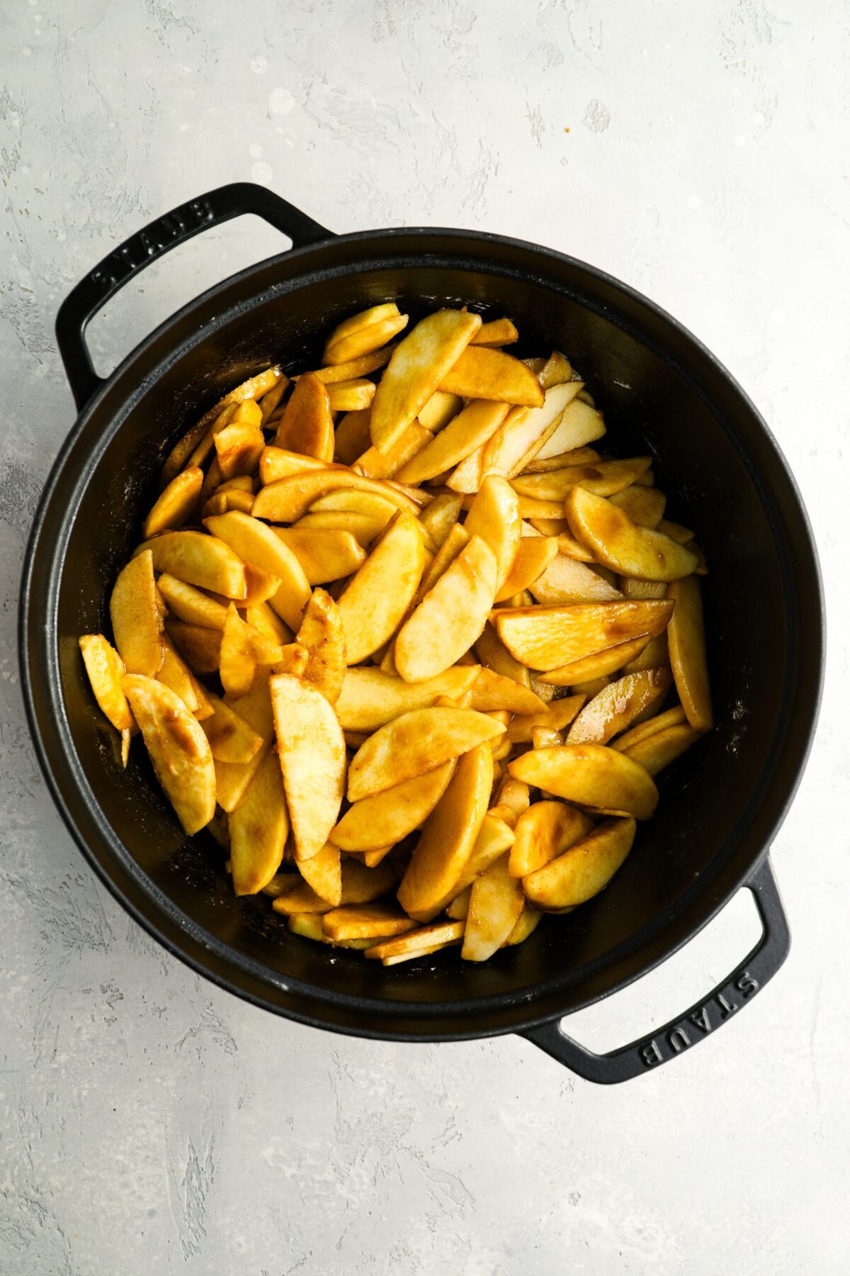 sliced apples, lemon juice, brown sugar, salt, cinnamon, flour, and cornstarch combined in large Dutch oven