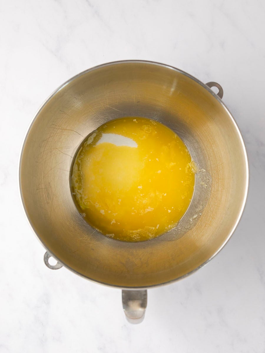 melted butter in bowl of electric mixer