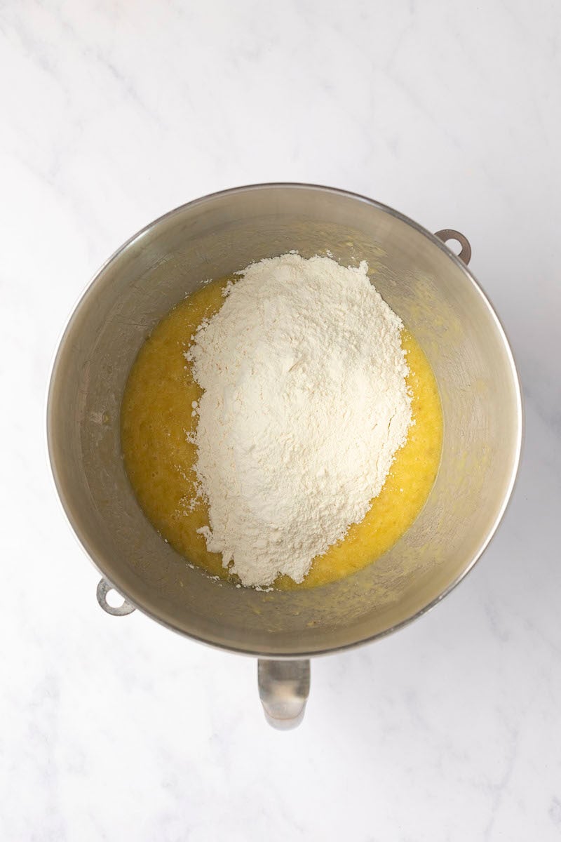 flour, salt and baking powder added to wet mixture in metal mixing bowl