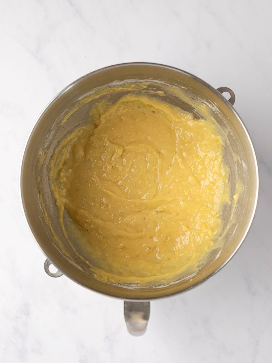 flour, salt, and baking powder fully combined with wet mixture in metal mixing bowl