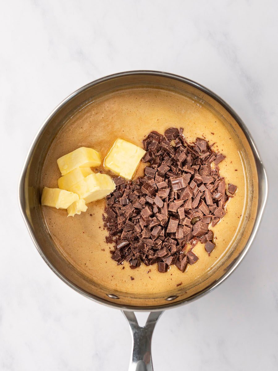 medium sauce pan with butter and chocolate added to corn syrup/brown sugar mix