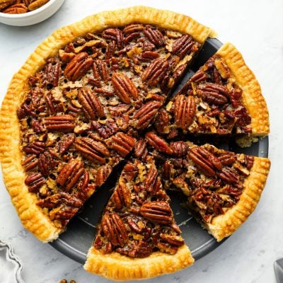 pecan pie sliced in pie dish