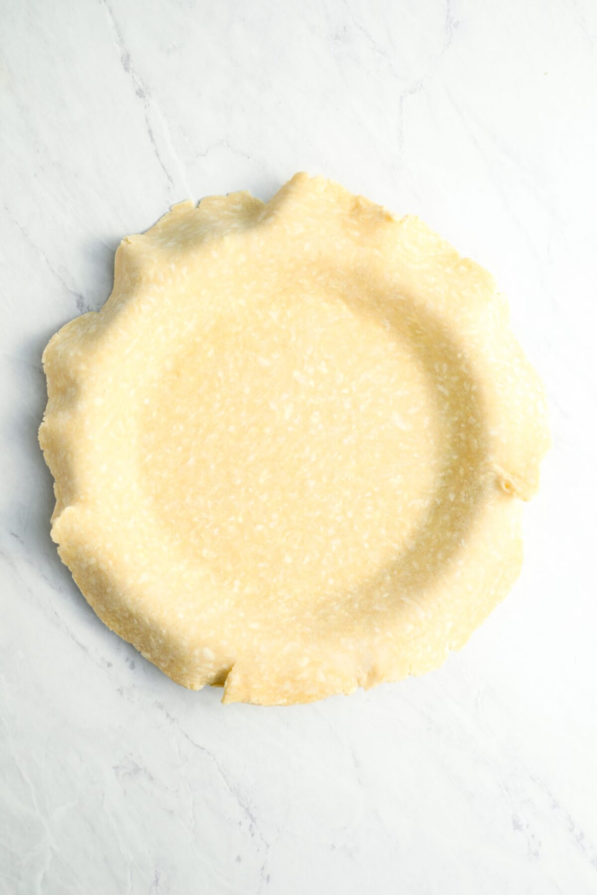 pie dough gently pressed into pie pan