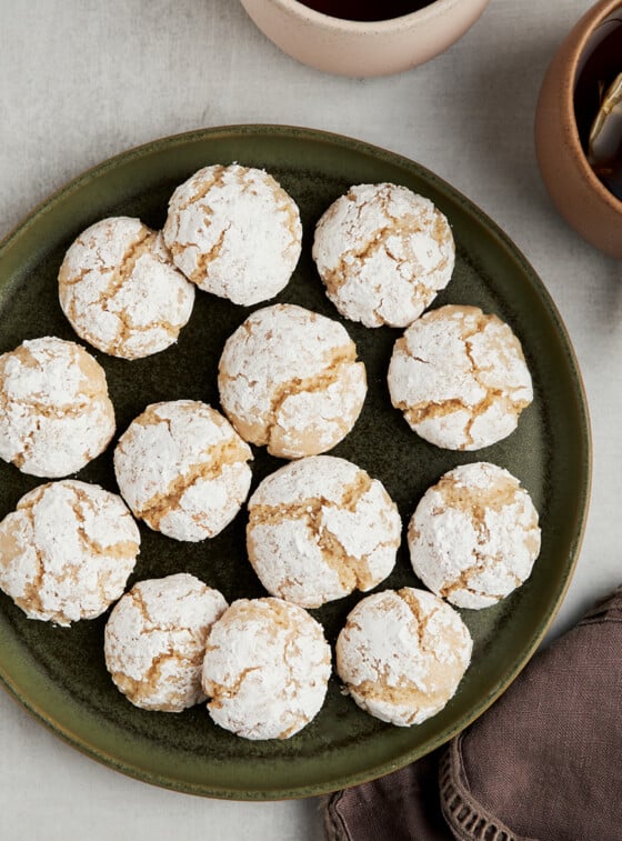 Almond cookies on plate with tea
