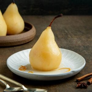 poached pear on plate