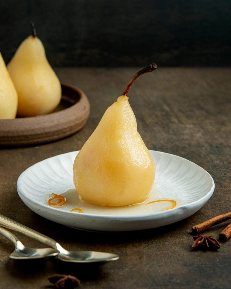 poached pear on plate