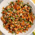 pico de gallo in white bowl with tortilla chips