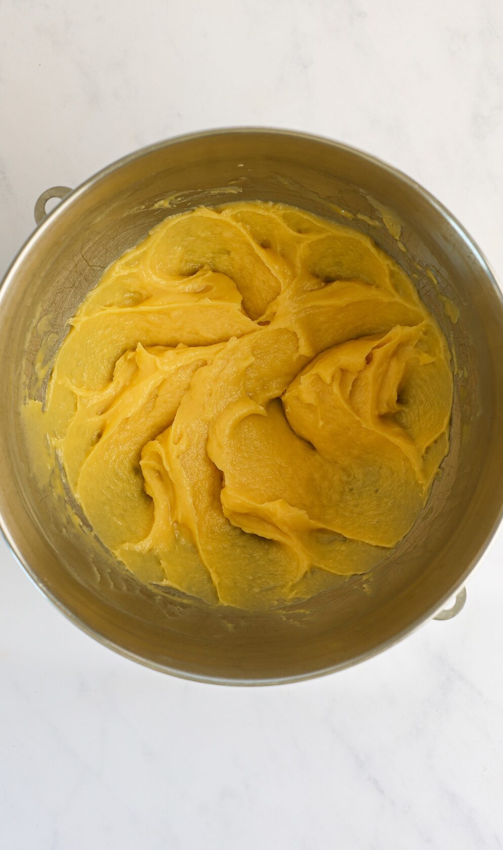 mixing bowl with dough after egg and vanilla mixed in
