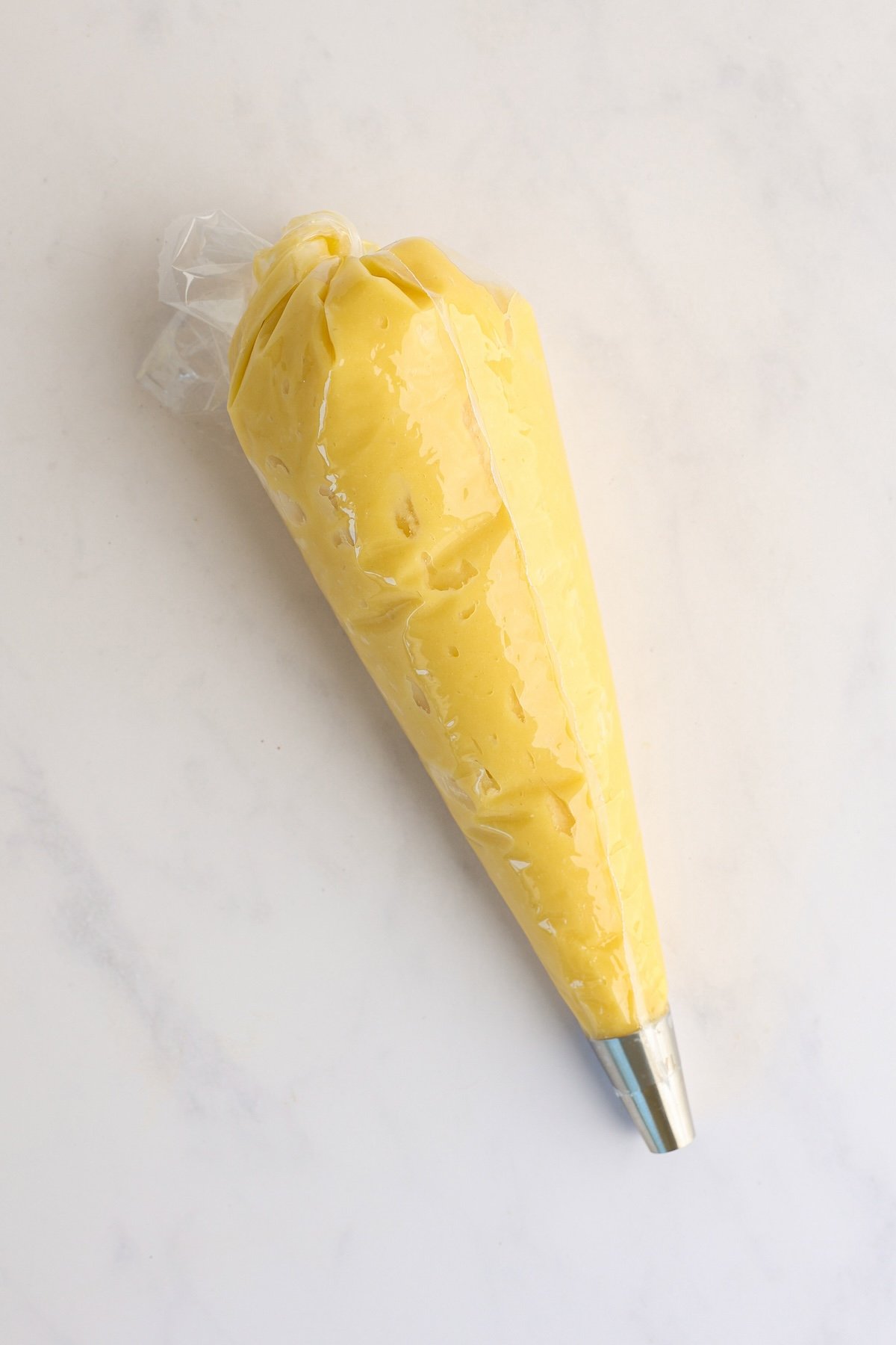 dough in pastry bag fitted with a ½-inch round tip