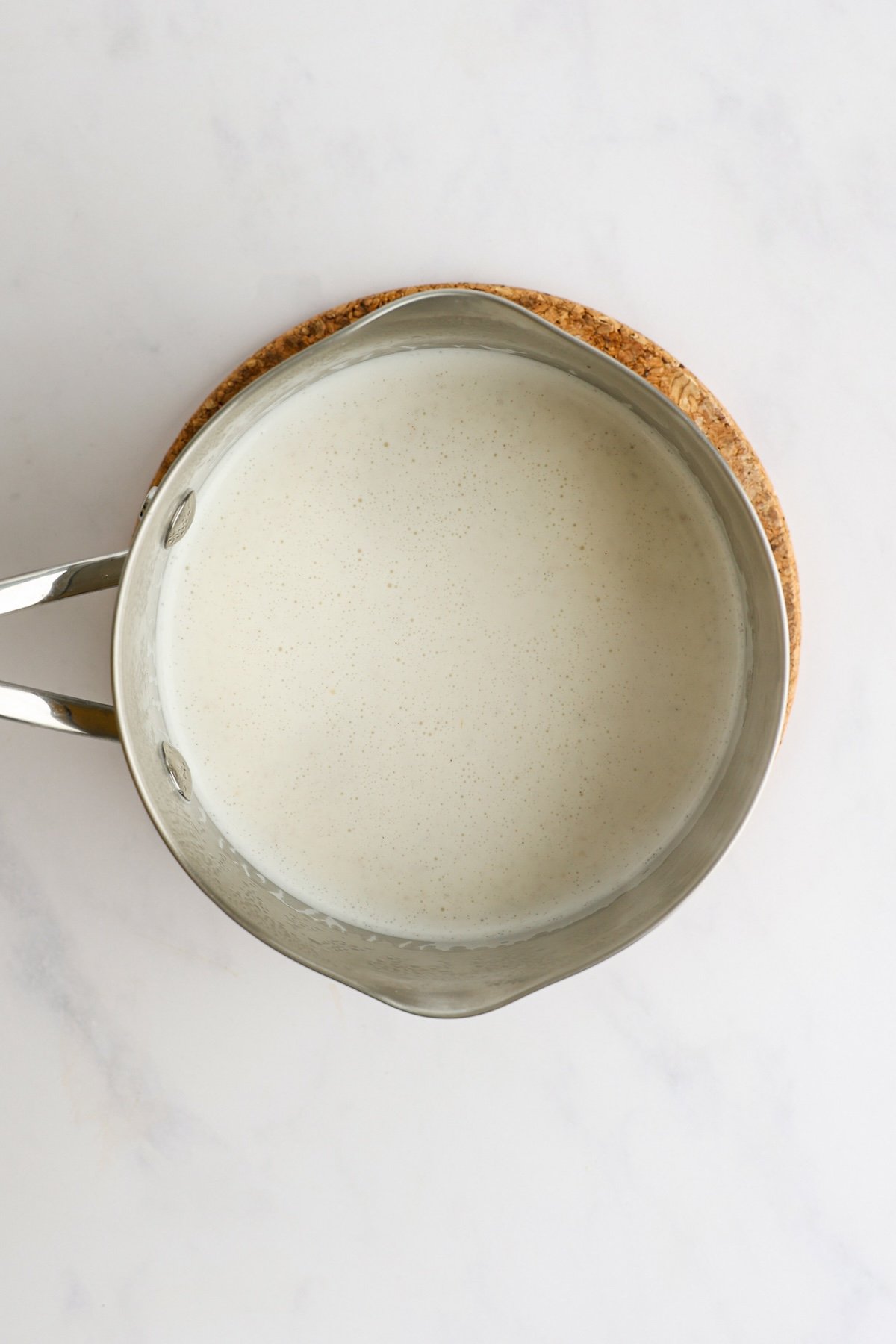 hot milk and vanilla in medium saucepan