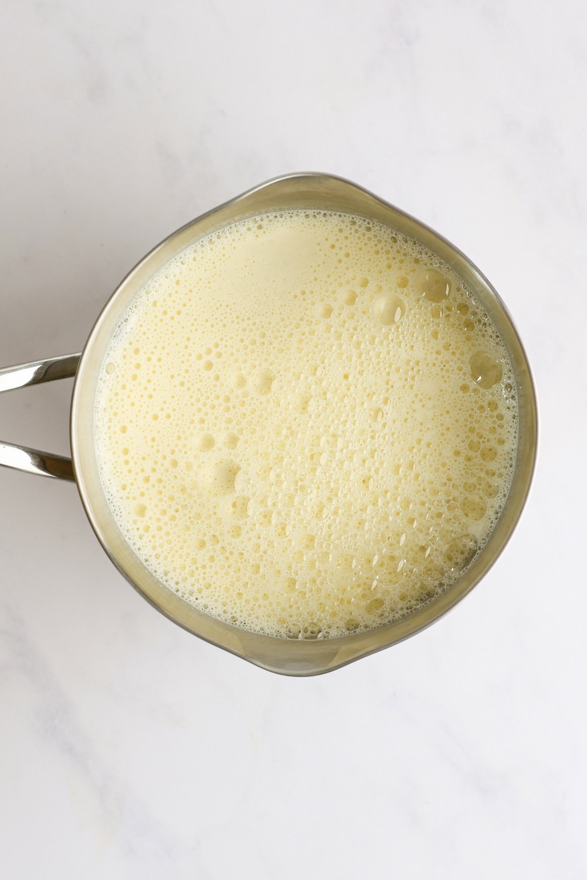 warm milk and sugar/egg mixture heating in saucepan