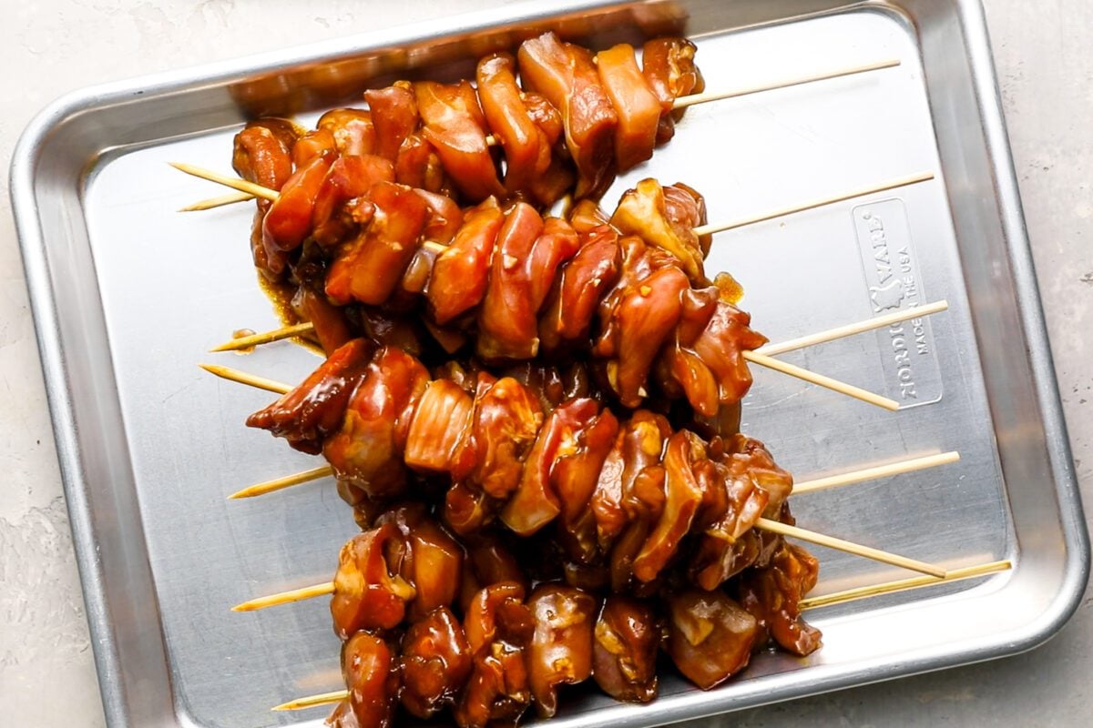 chicken threaded on wooden skewers