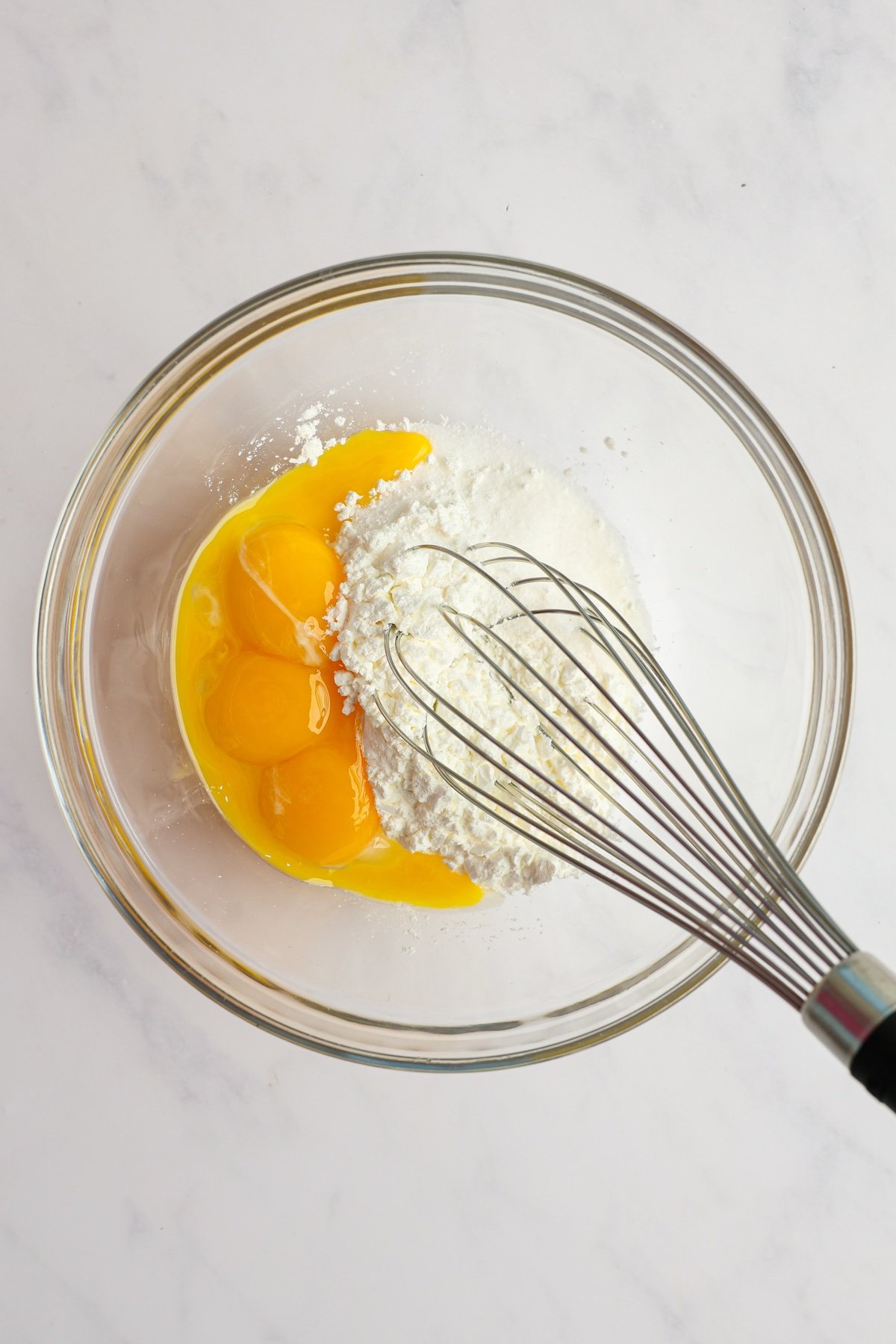 whisking egg yolks and cornstarch