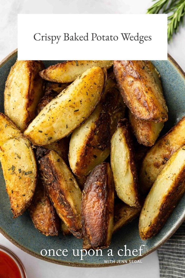 crispy potato wedges in blue serving bowl