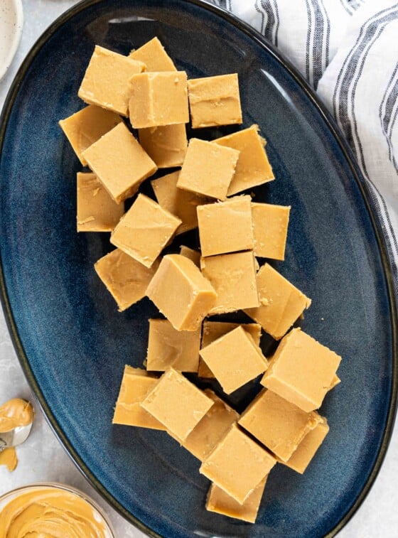 peanut butter fudge squares on blue platter