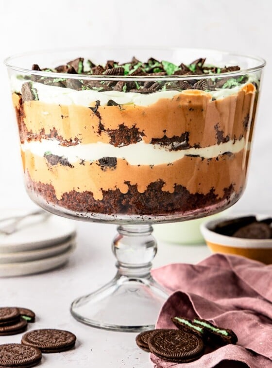 Chocolate mint trile in trifle dish with chocolate mint cookies nearby